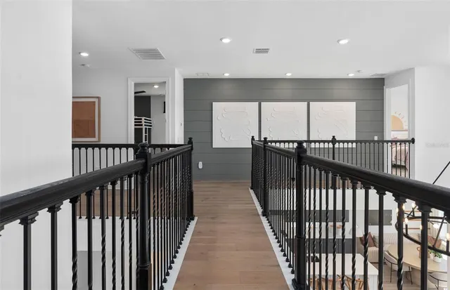 a bedroom with a large bed and a table