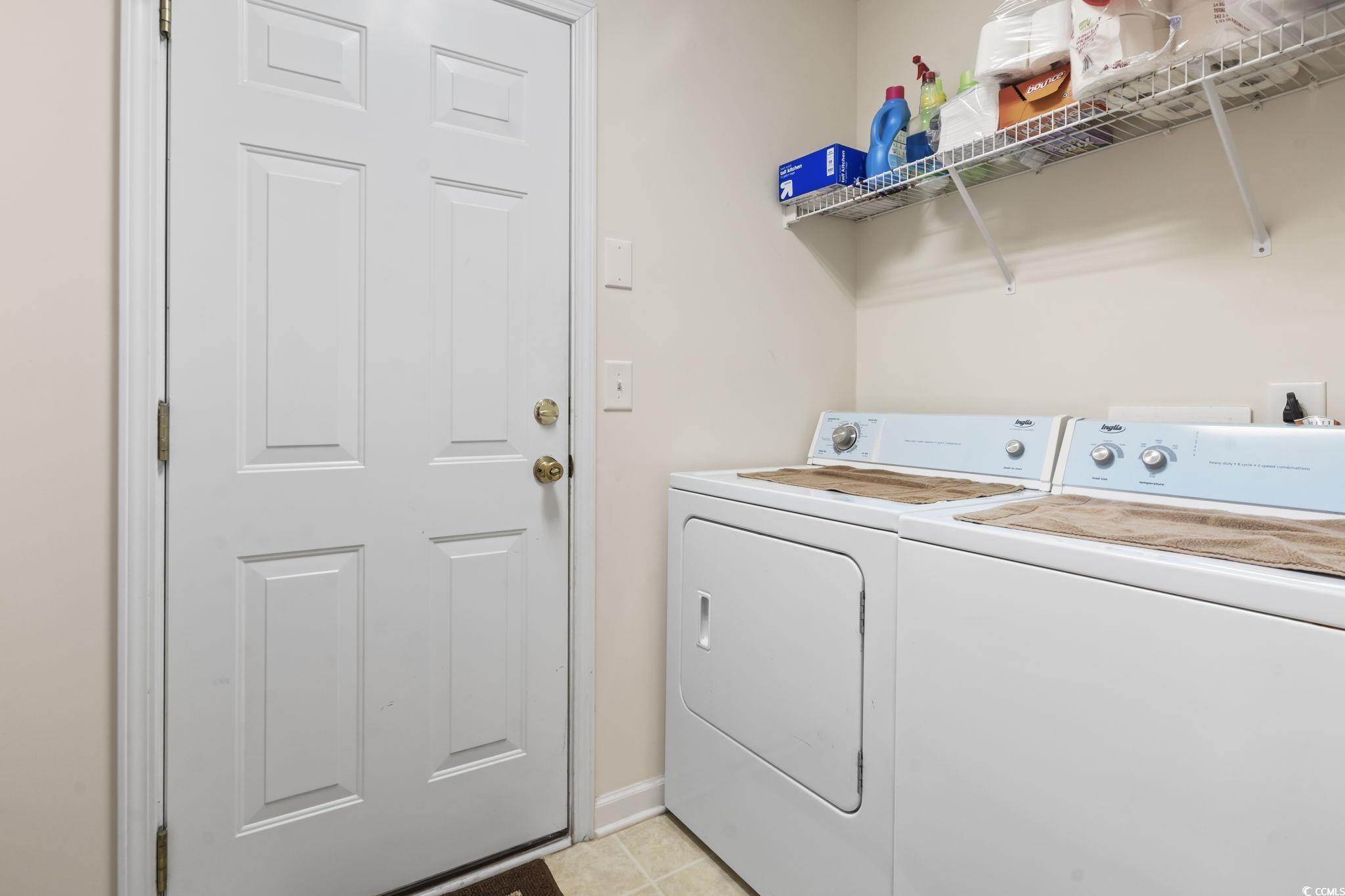 2288 Beauclair Court Myrtle Beach, SC 29579 - Photo 27 of 40 Laundry room featuring light tile patterned floors, laundry area, separate washer and dryer, and baseboards
