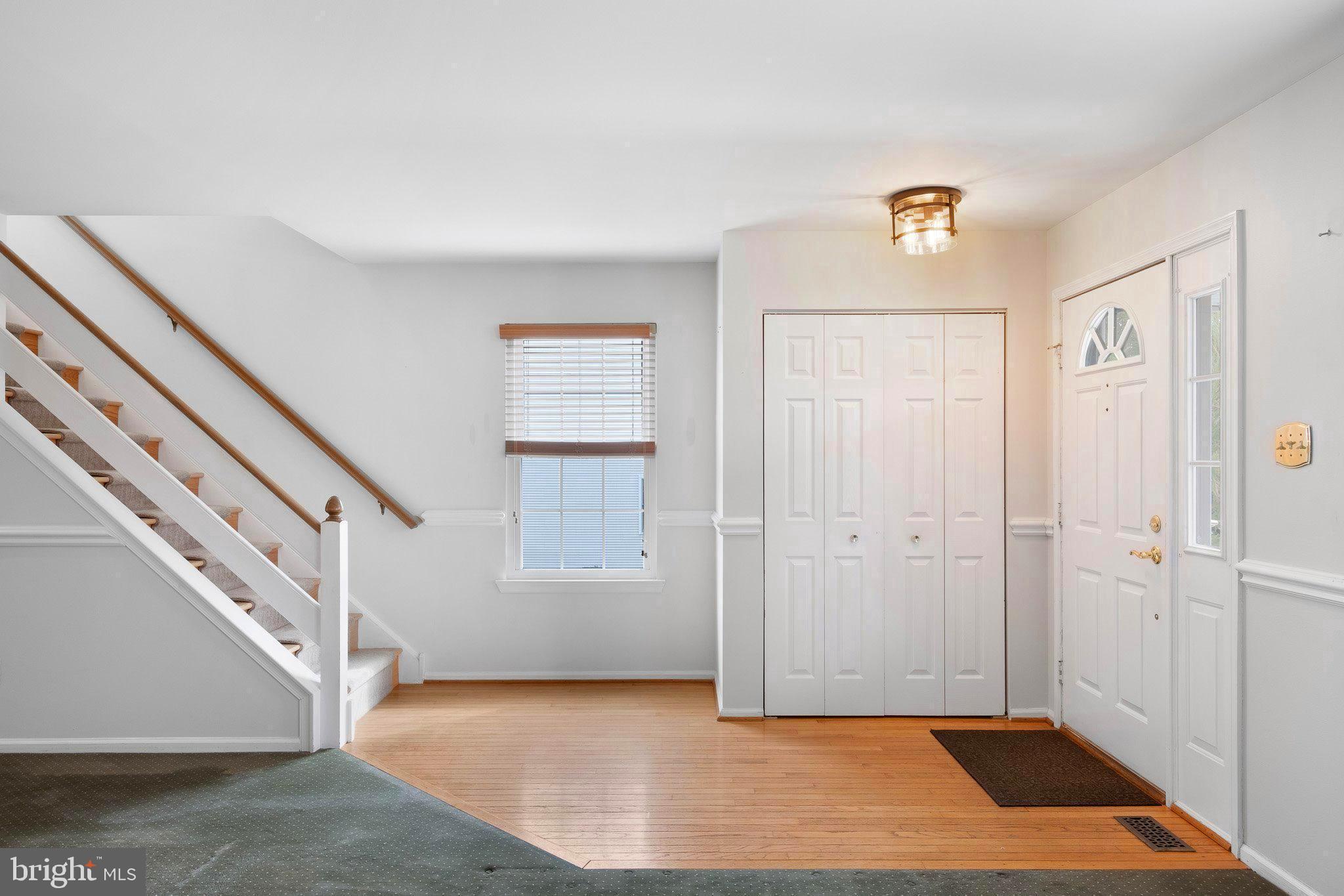 163 Cambridge Circle, Unit 78 Kennett Square, PA 19348 - Photo 17 of 30 a view of an entryway with wooden floor