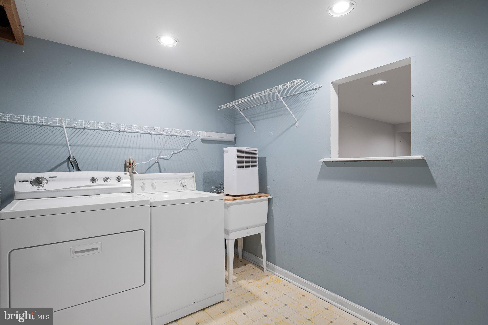 163 Cambridge Circle, Unit 78 Kennett Square, PA 19348 - Photo 27 of 30 a utility room with dryer and washer