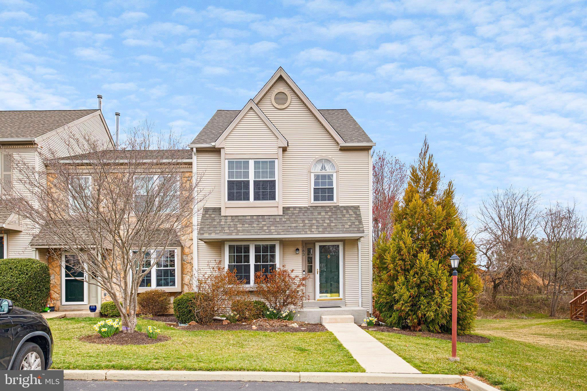 163 Cambridge Circle, Unit 78 Kennett Square, PA 19348 - Photo 29 of 30 a front view of a house with garden