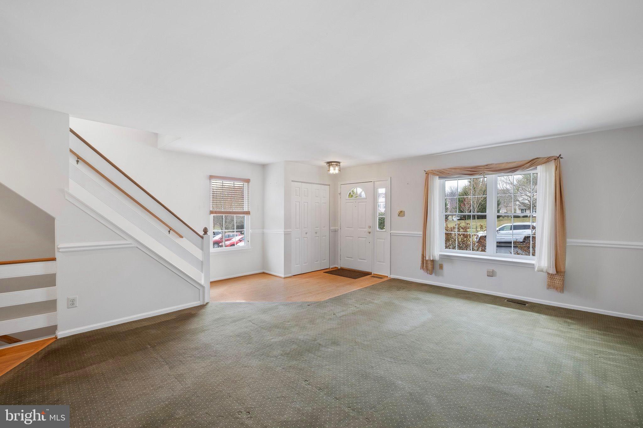 163 Cambridge Circle, Unit 78 Kennett Square, PA 19348 - Photo 3 of 30 a view of an empty room with a window
