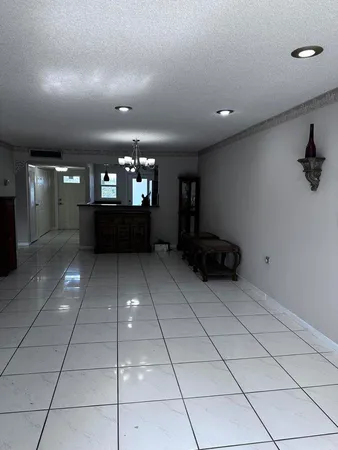 a living room with a couch and a flat screen tv