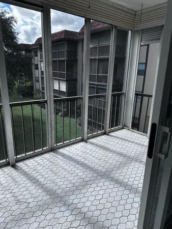 a view of backyard from balcony