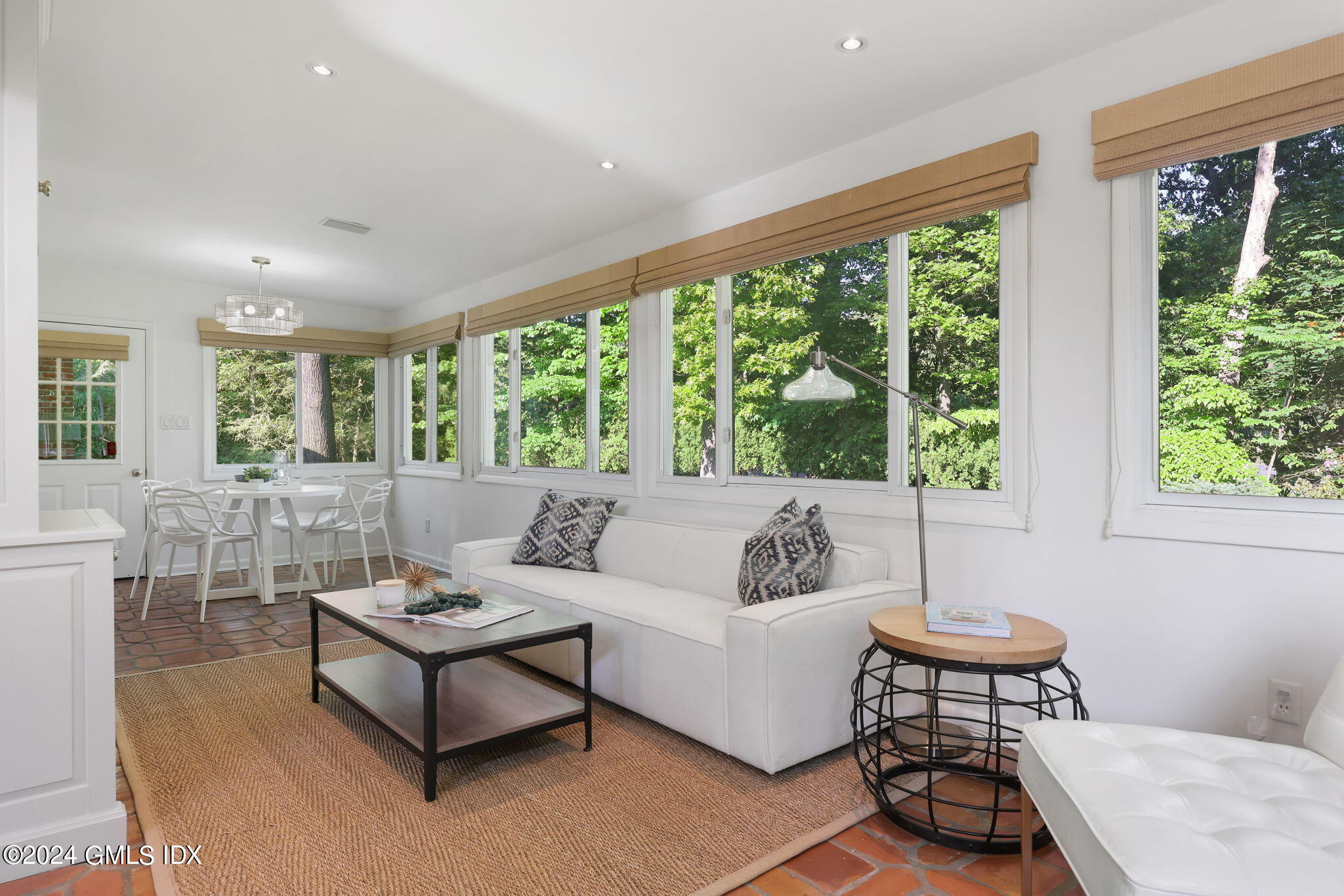 18 Crawford Terrace Riverside, CT 06878 - Photo 12 of 31 a living room with furniture and a large window