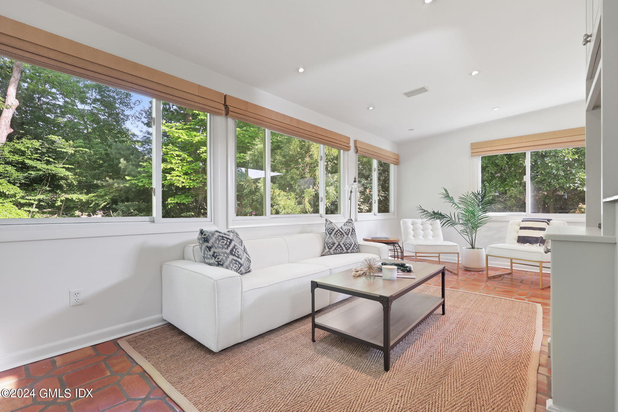 18 Crawford Terrace Riverside, CT 06878 - Photo 13 of 31 a living room with furniture and a large window
