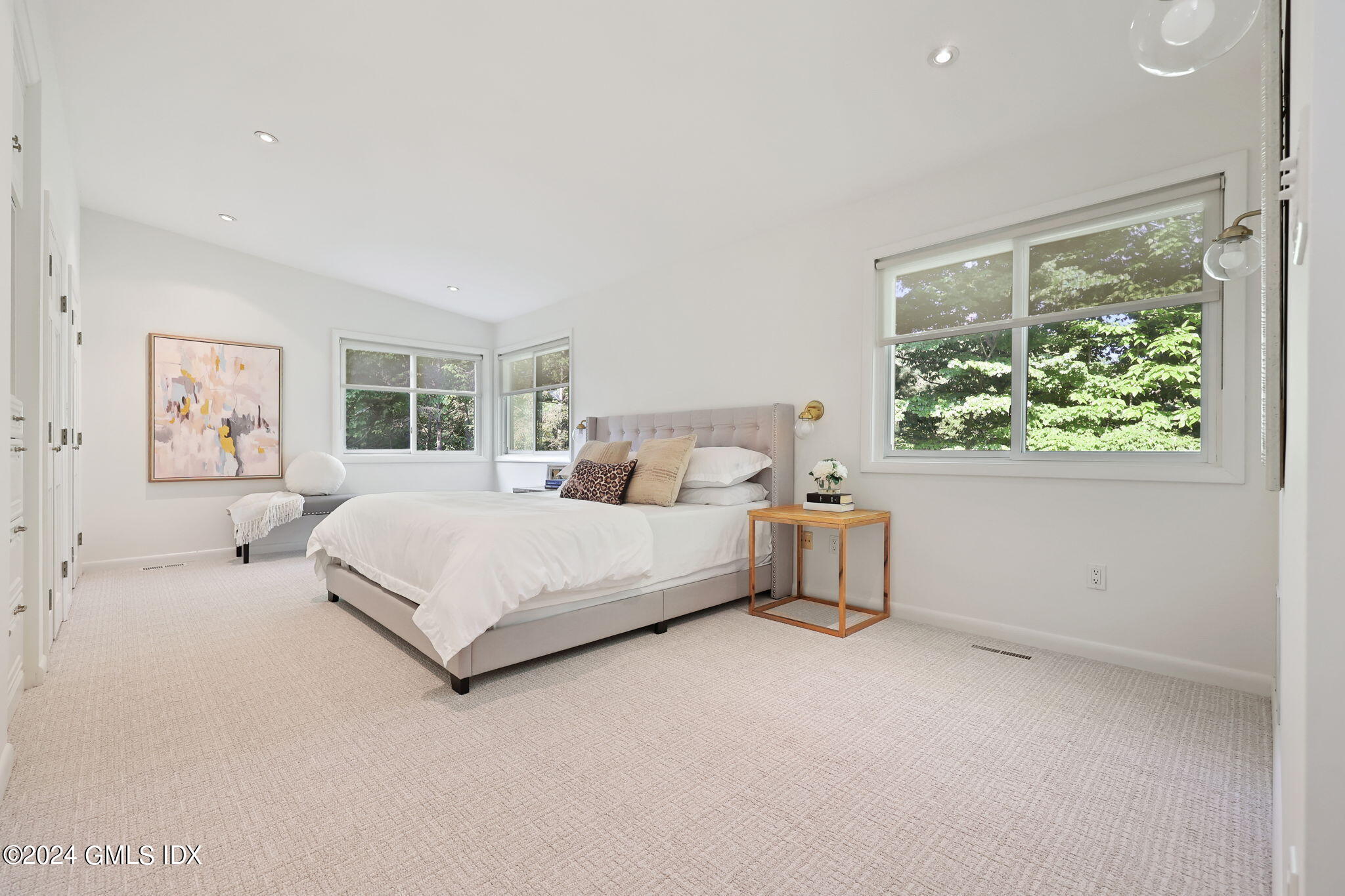 18 Crawford Terrace Riverside, CT 06878 - Photo 14 of 31 a bedroom with a large bed and a large window