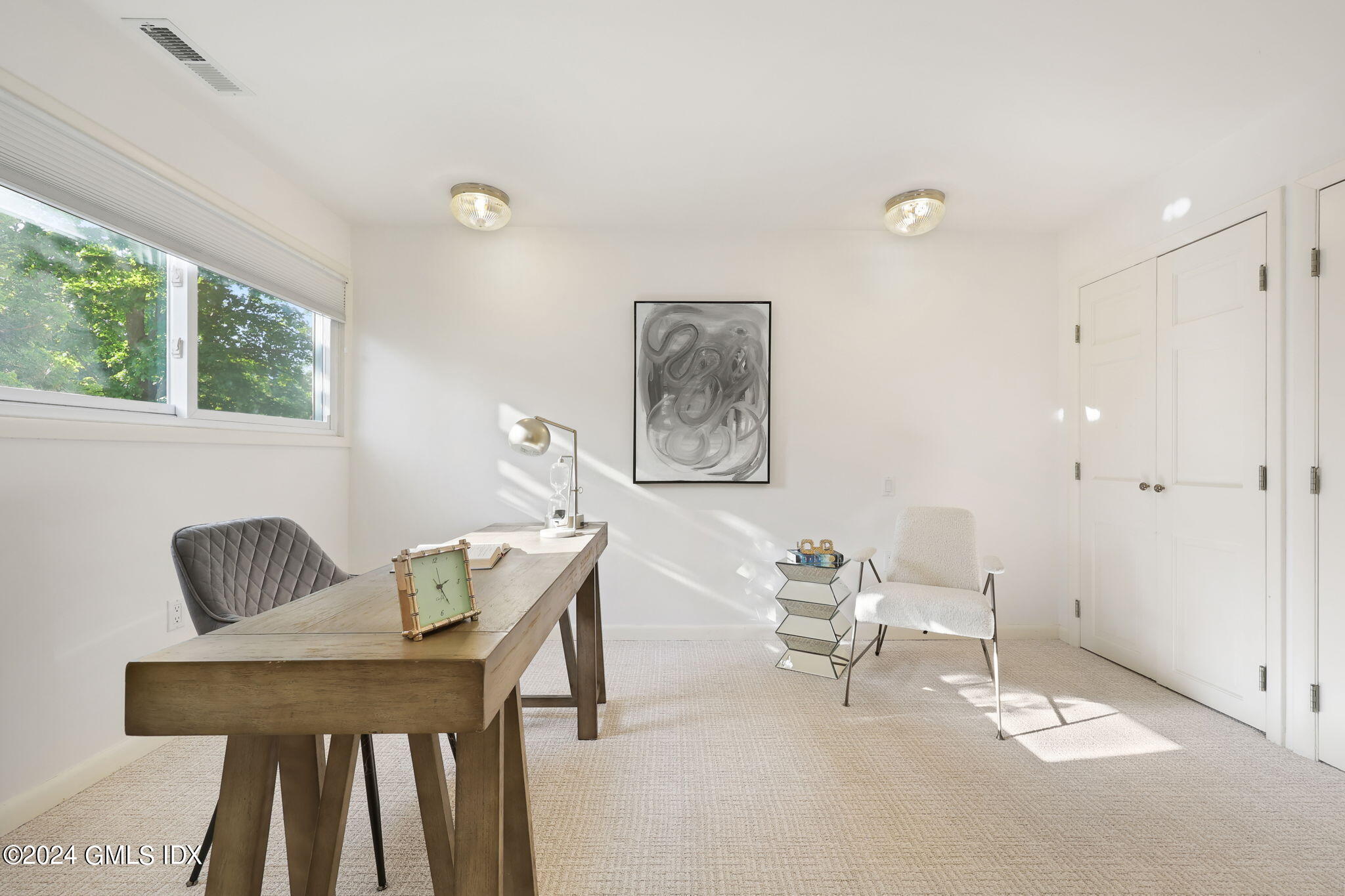 18 Crawford Terrace Riverside, CT 06878 - Photo 24 of 31 a view of a livingroom with furniture and a window