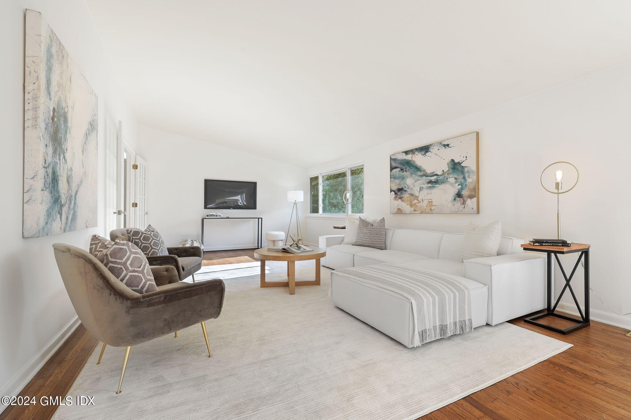18 Crawford Terrace Riverside, CT 06878 - Photo 6 of 31 a living room with furniture a rug and a window