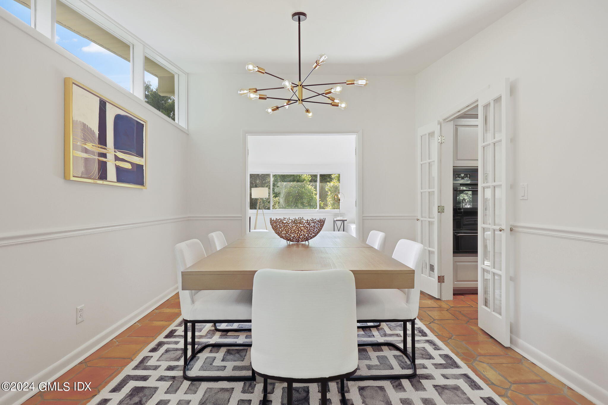 18 Crawford Terrace Riverside, CT 06878 - Photo 8 of 31 a view of a dining room with furniture window and wooden floor