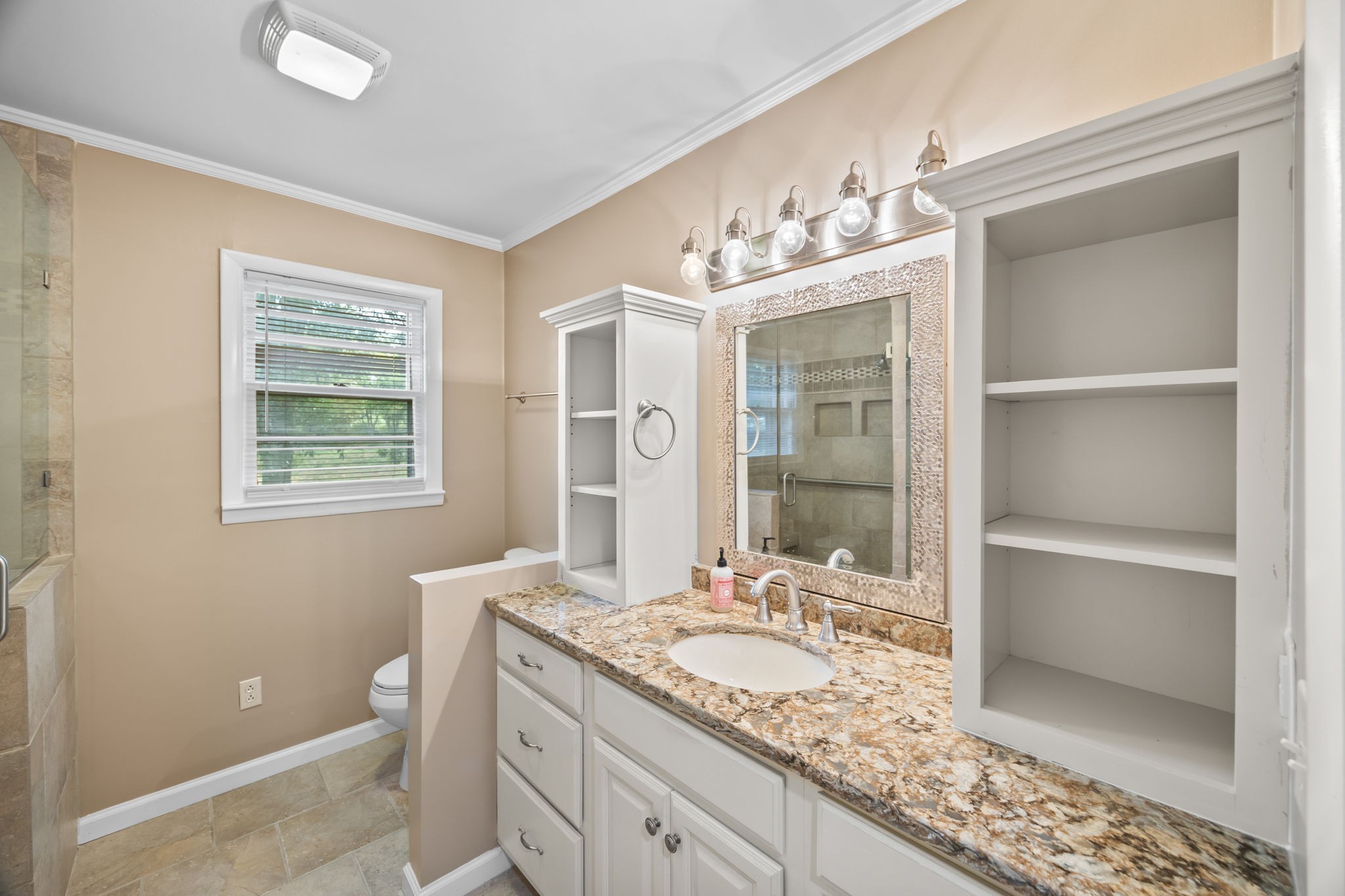6510 Clemons Ridge Road Silver Point, TN 38582 - Photo 19 of 44 a bathroom with a granite countertop sink a mirror and a