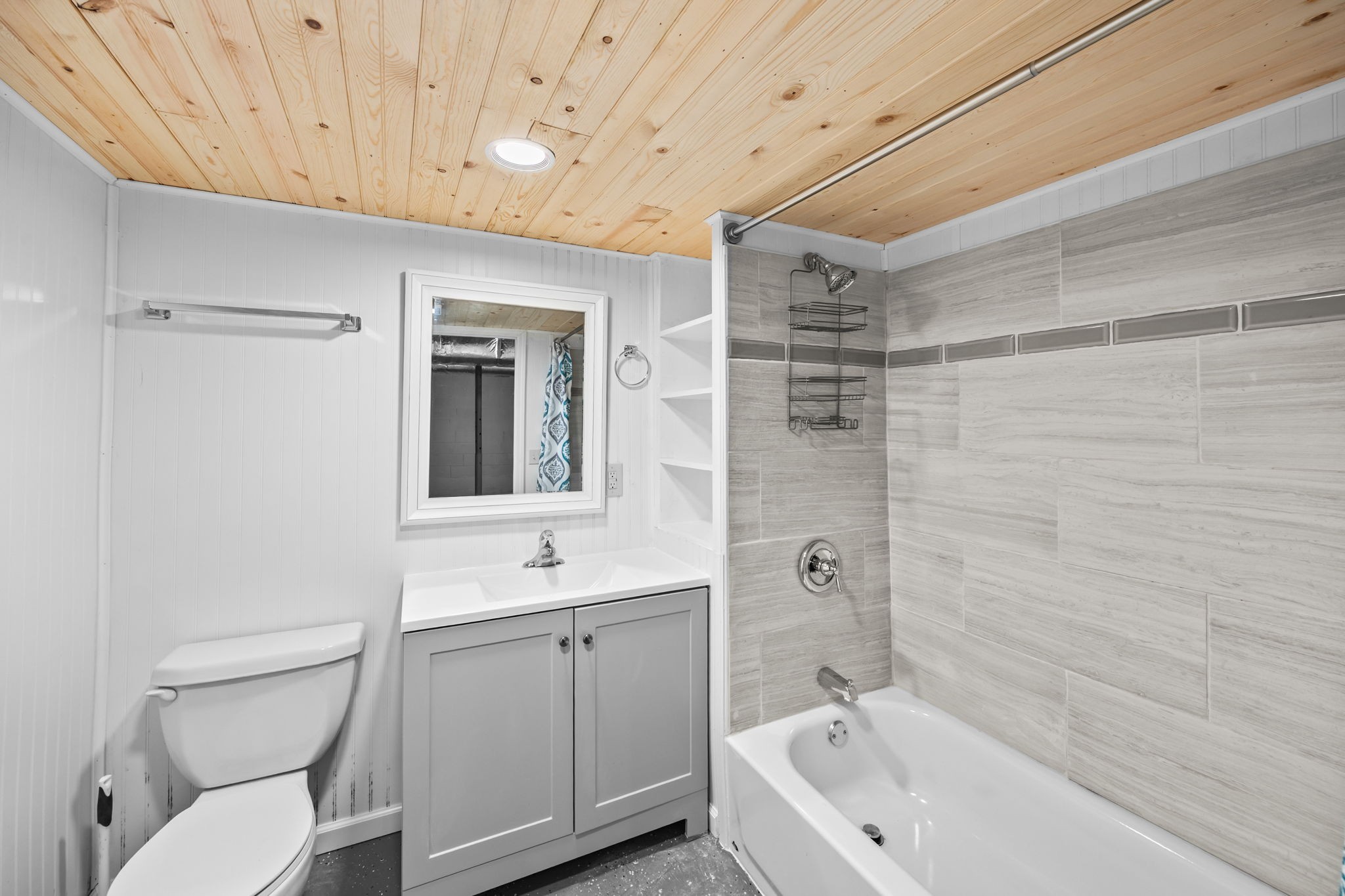 6510 Clemons Ridge Road Silver Point, TN 38582 - Photo 26 of 44 a bathroom with a sink a toilet and shower
