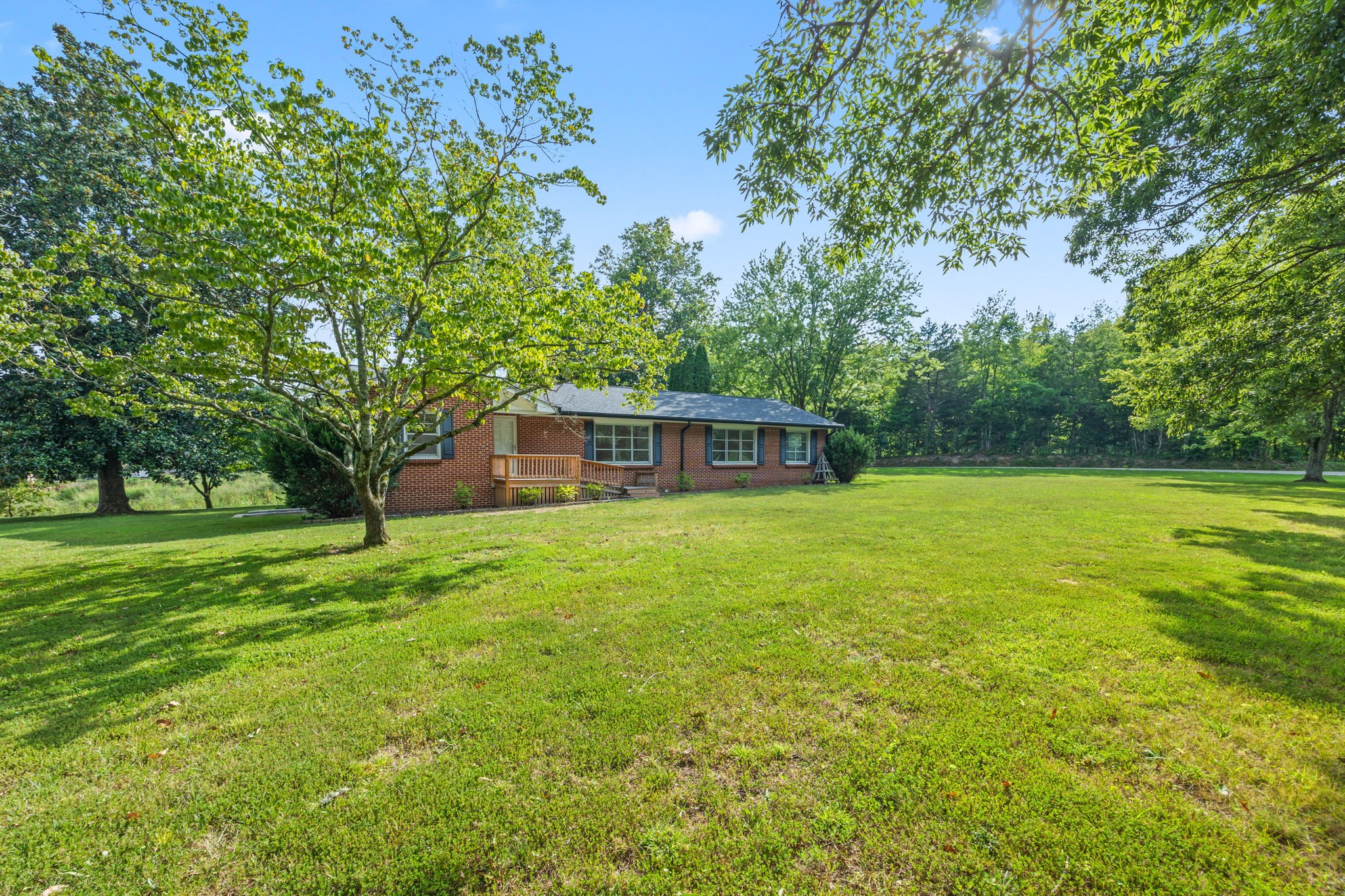 6510 Clemons Ridge Road Silver Point, TN 38582 - Photo 29 of 44 a front view of a house with a garden