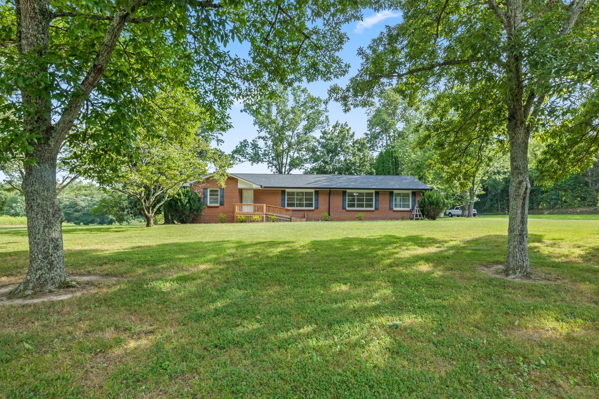 6510 Clemons Ridge Road Silver Point, TN 38582 - Photo 30 of 44 a front view of a house with a garden