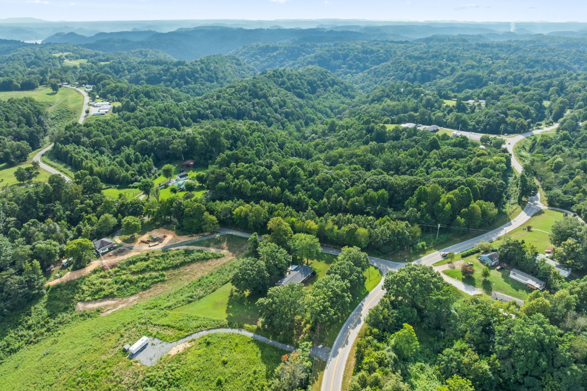 6510 Clemons Ridge Road Silver Point, TN 38582 - Photo 39 of 44 an aerial view of residential houses with outdoor space and trees all around