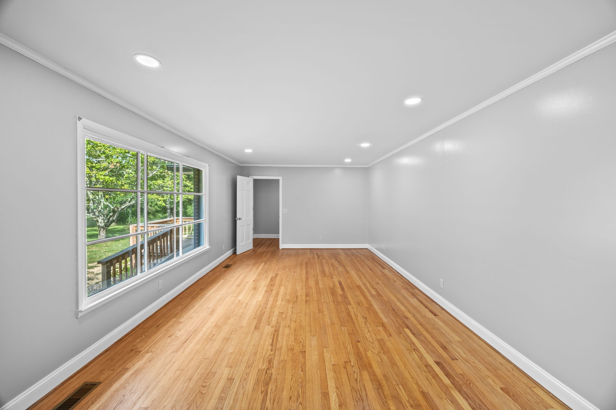 6510 Clemons Ridge Road Silver Point, TN 38582 - Photo 7 of 44 a view of empty room with wooden floor and fan