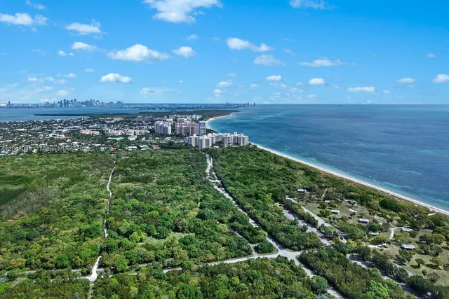 a view of a city with tall buildings in front of it