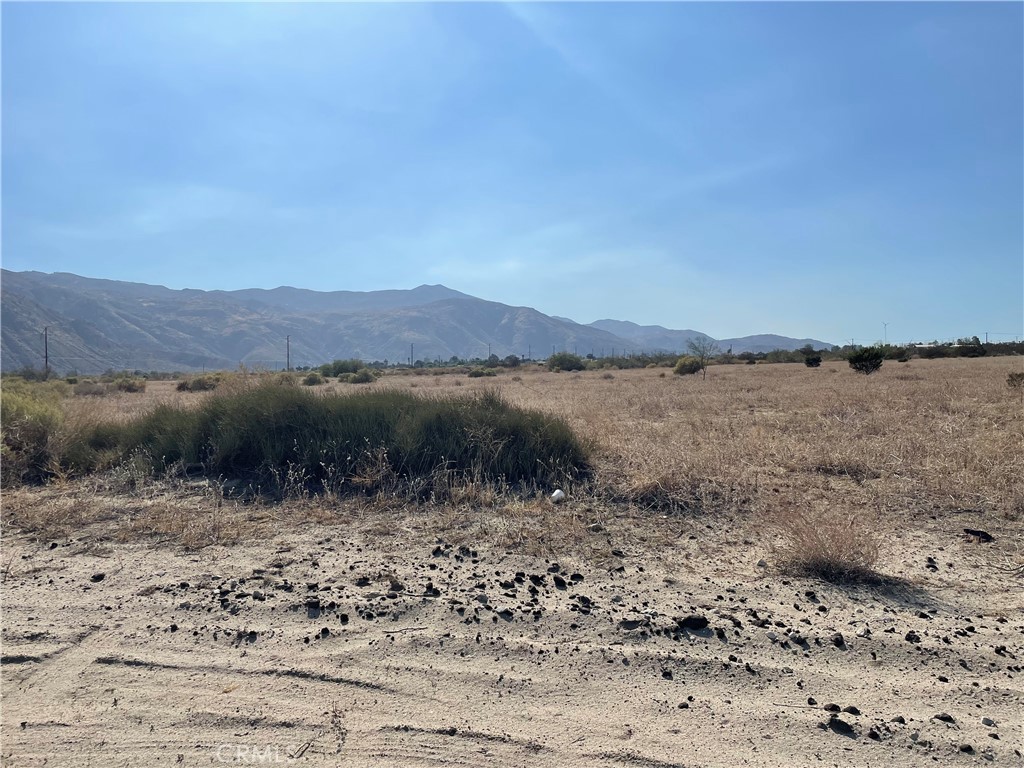 0 Olive Street Cabazon, CA 92230 - Photo 11 of 13 a view of a lake with mountains in the background