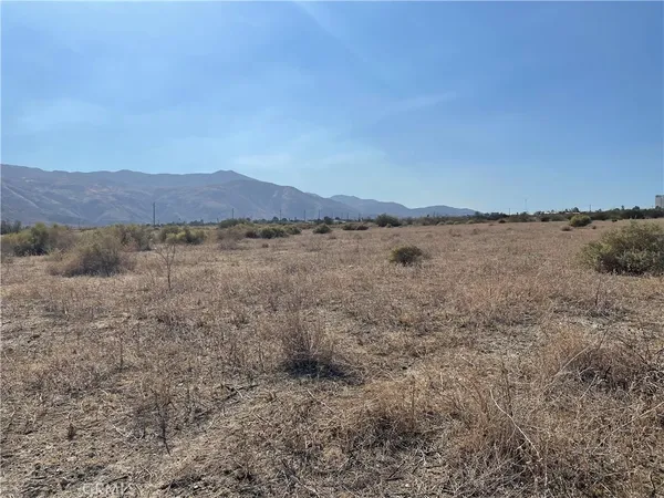 a view of lake with mountain