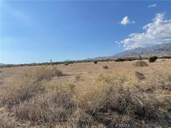 a view of mountain and sunset