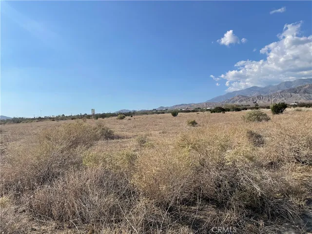 a view of mountain and sunset