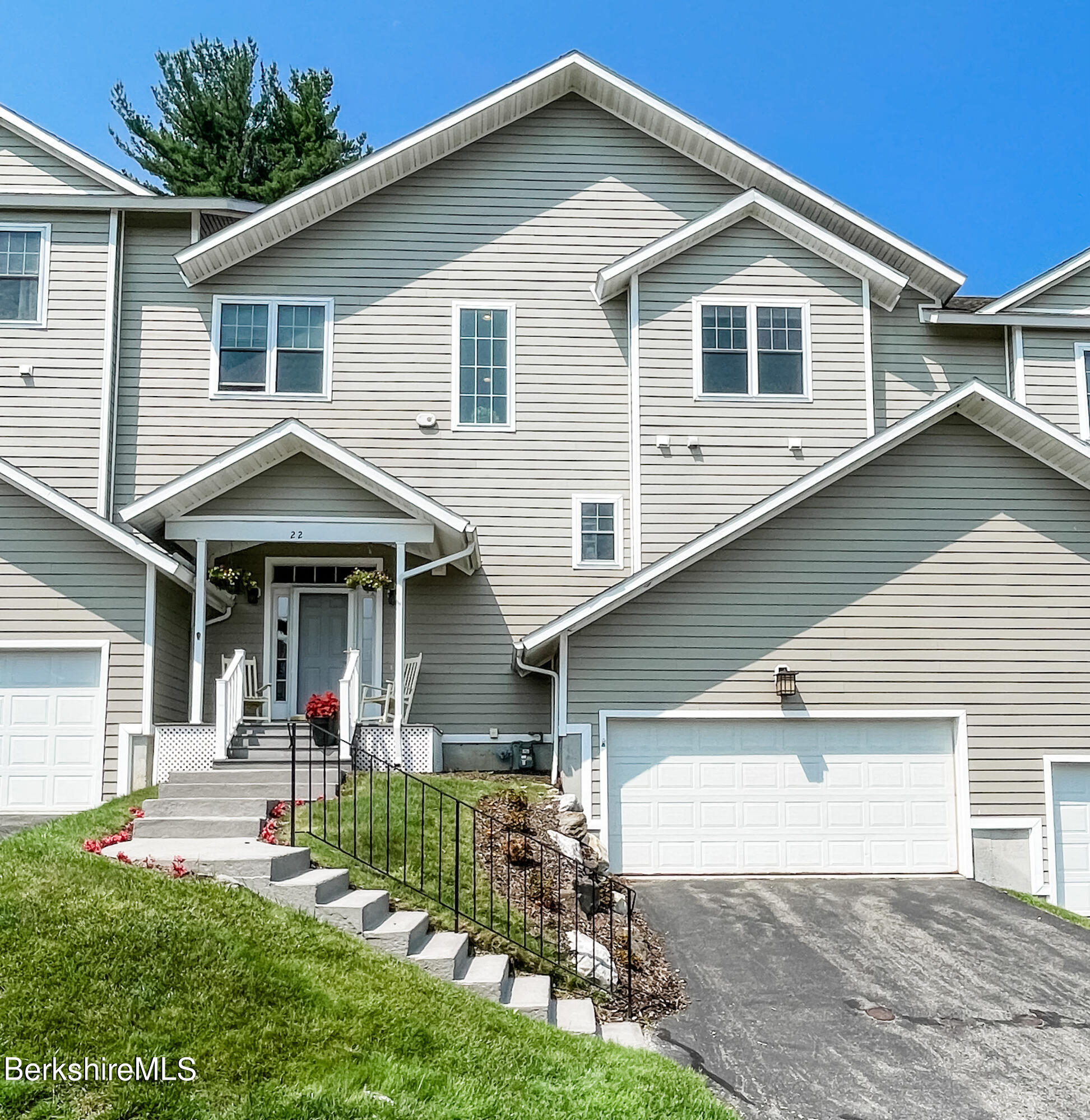 22 Alpine Trail Pittsfield, MA 01201 - Photo 1 of 35 a front view of a house with a yard and garage