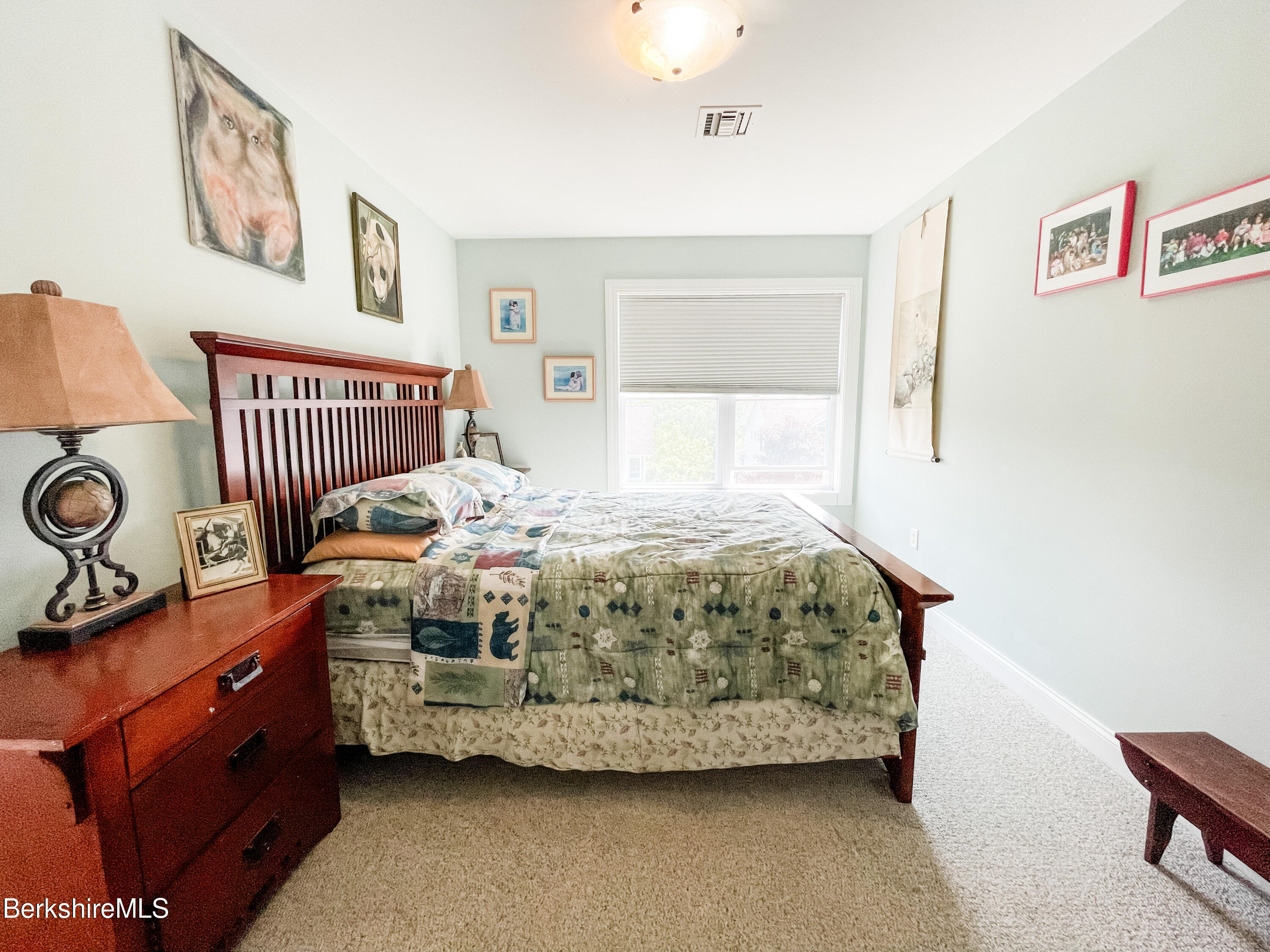 22 Alpine Trail Pittsfield, MA 01201 - Photo 20 of 35 a bedroom with a bed and a window