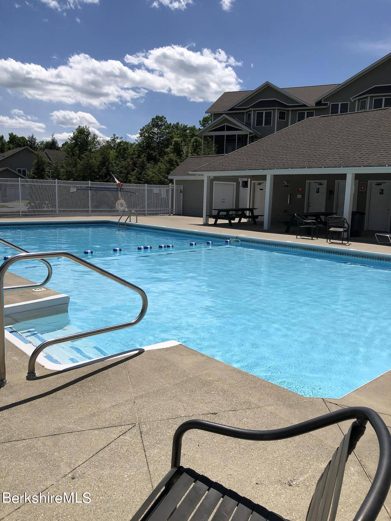 22 Alpine Trail Pittsfield, MA 01201 - Photo 30 of 35 a view of a swimming pool with a deck