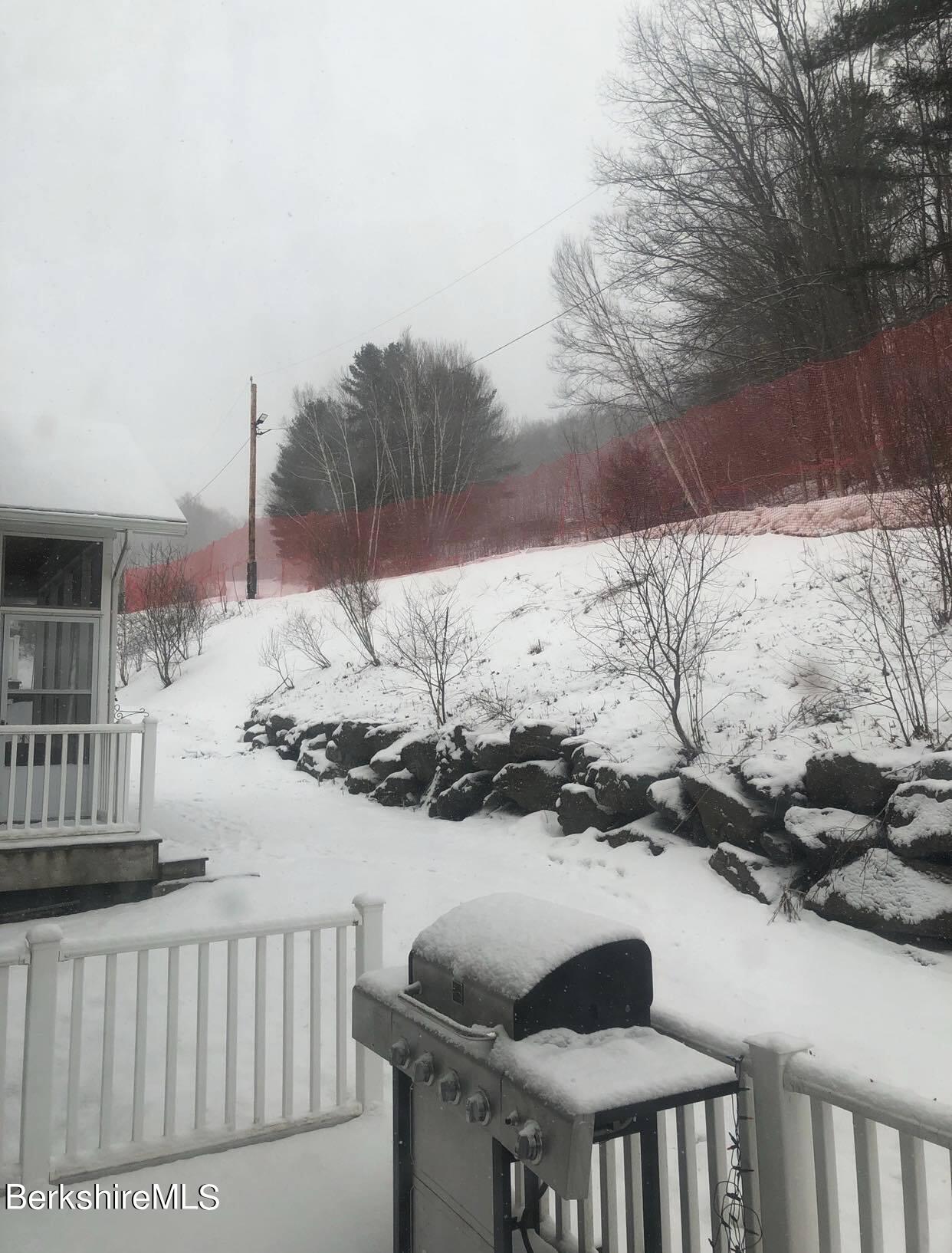 22 Alpine Trail Pittsfield, MA 01201 - Photo 33 of 35 a view of a house with a snow