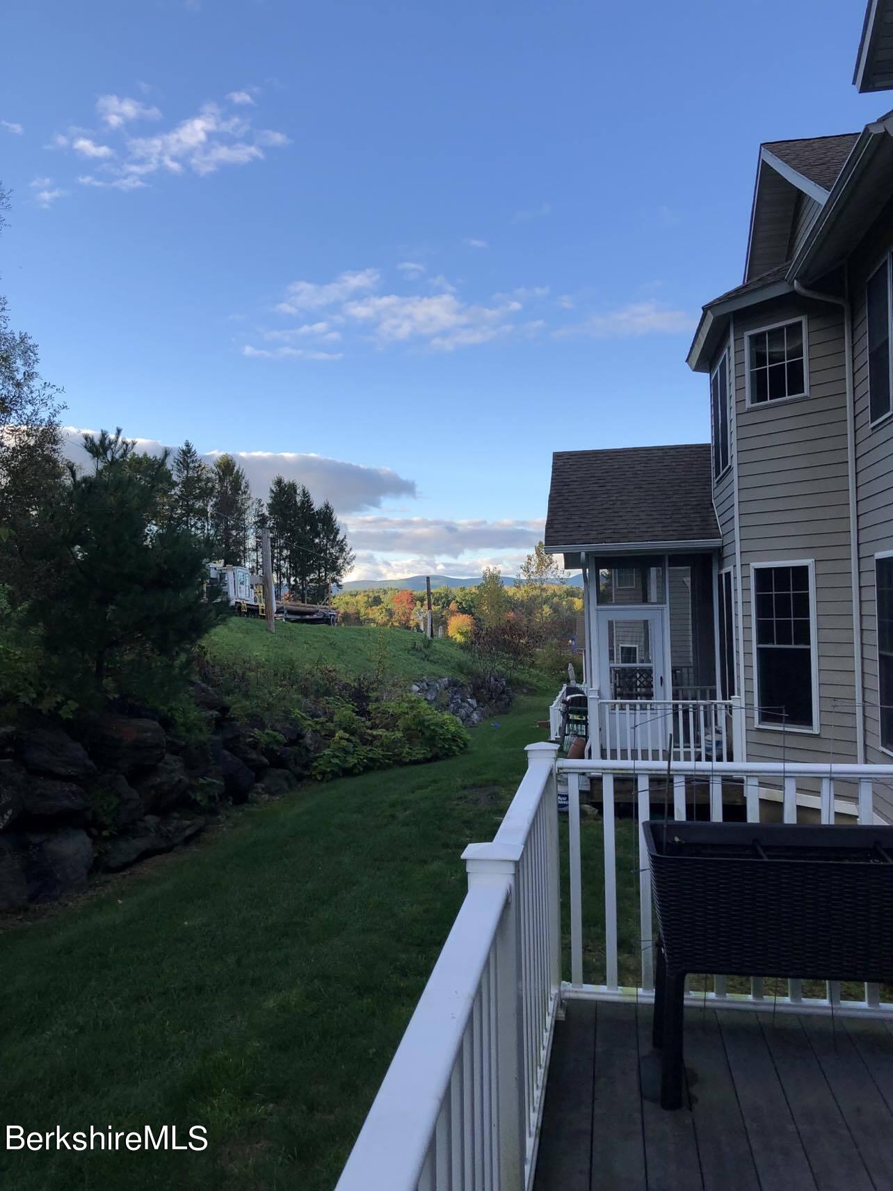 22 Alpine Trail Pittsfield, MA 01201 - Photo 4 of 35 a view of house with outdoor space and sitting area