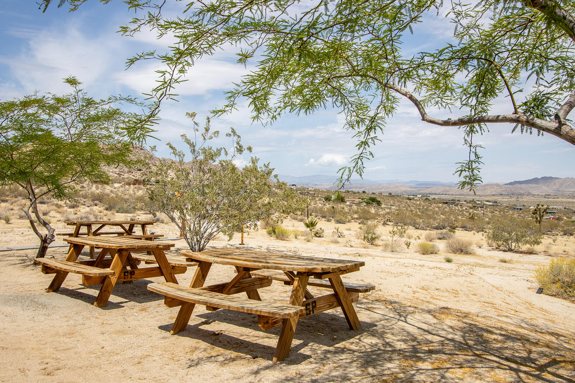 7122 Sunkist Road Joshua Tree, CA 92252 - Photo 24 of 61 a view of a terrace with chairs