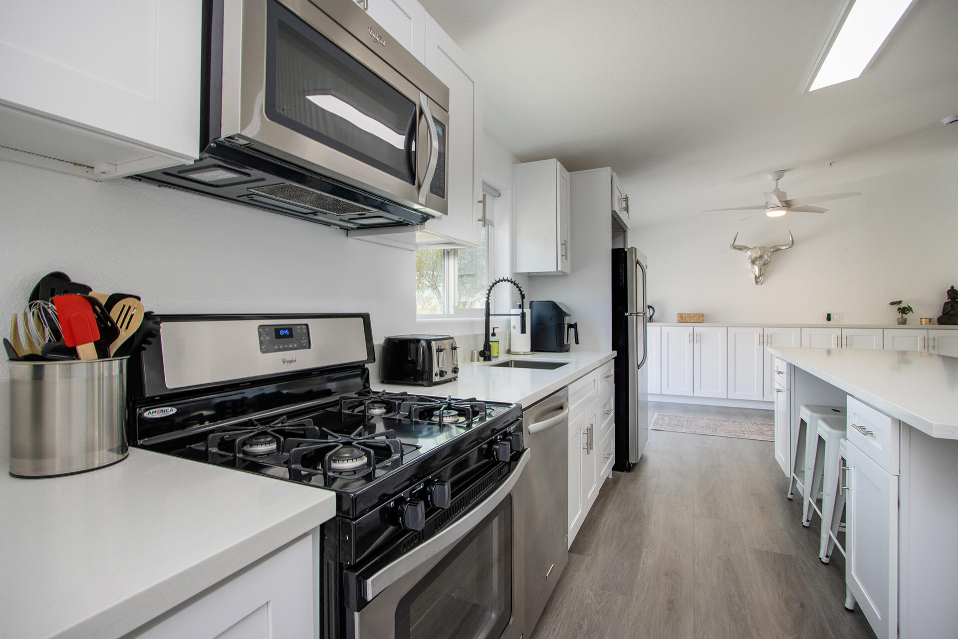 7122 Sunkist Road Joshua Tree, CA 92252 - Photo 36 of 61 a kitchen with a stove and a sink