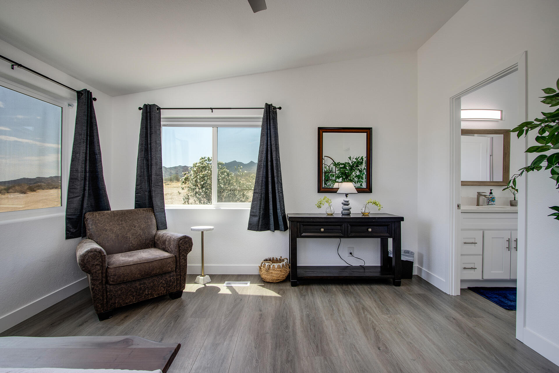 7122 Sunkist Road Joshua Tree, CA 92252 - Photo 51 of 61 a living room with furniture and a large window