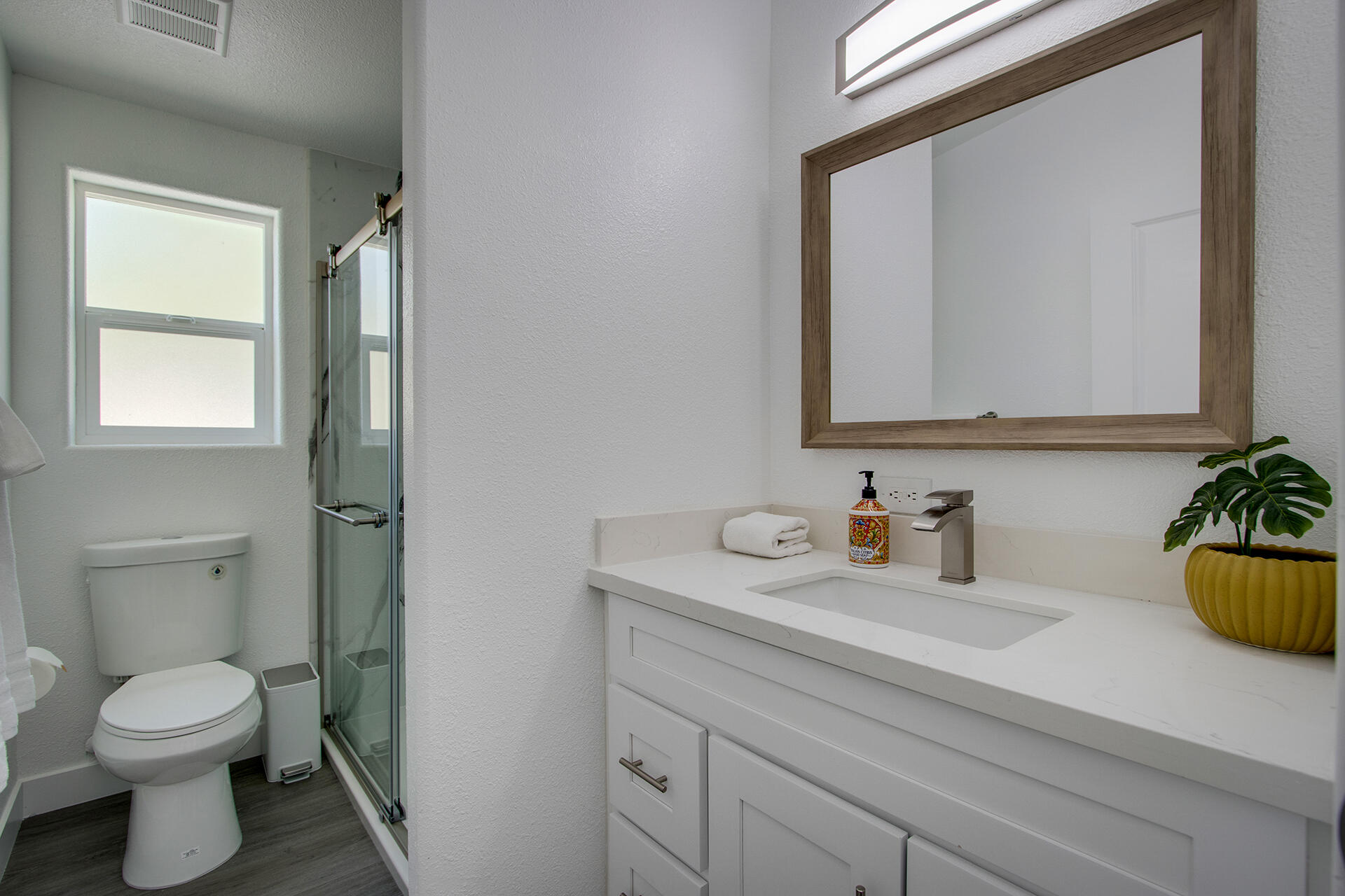 7122 Sunkist Road Joshua Tree, CA 92252 - Photo 54 of 61 a bathroom with a toilet a sink and mirror