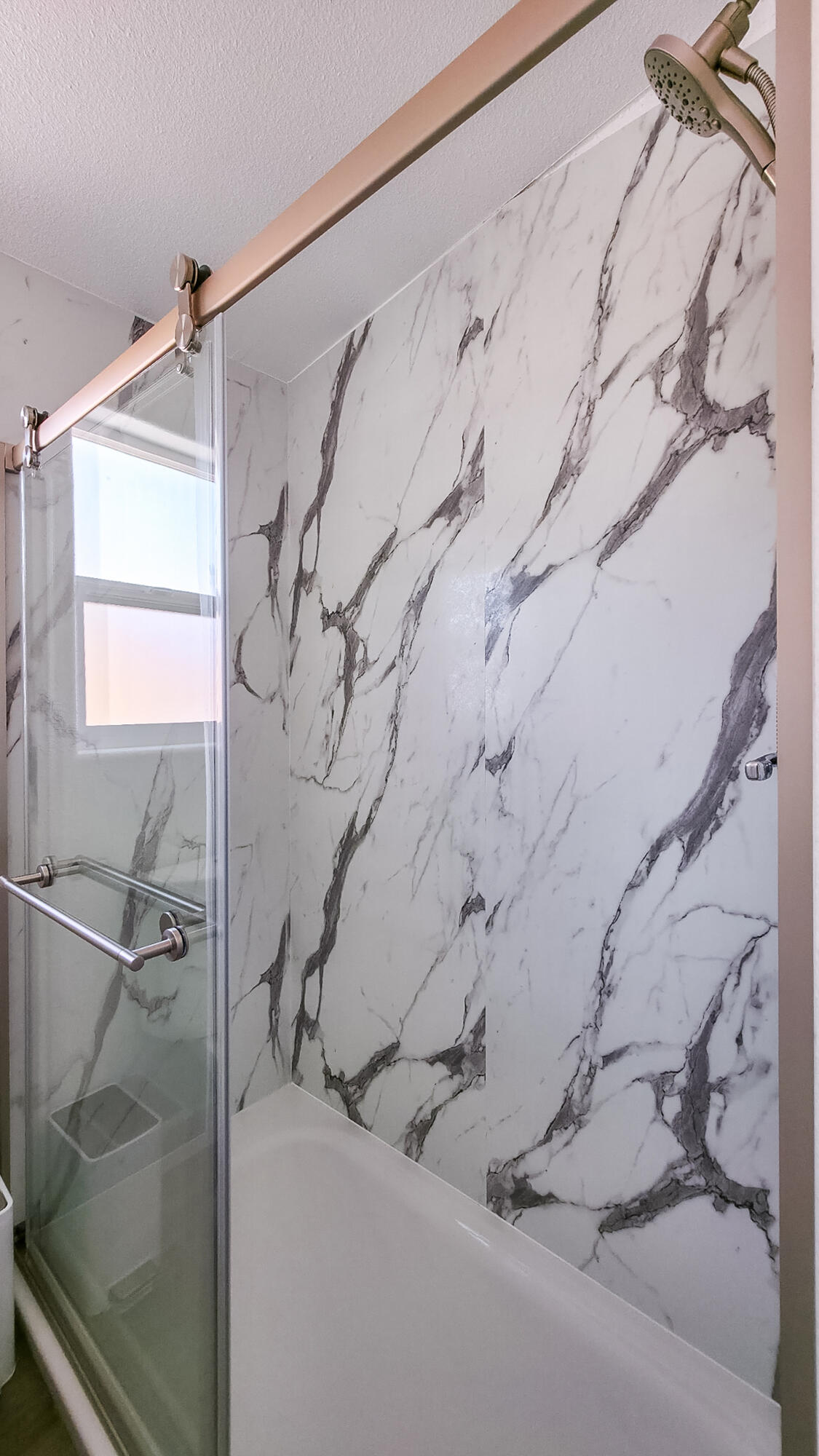 7122 Sunkist Road Joshua Tree, CA 92252 - Photo 55 of 61 a bathroom with a shower and a bathtub