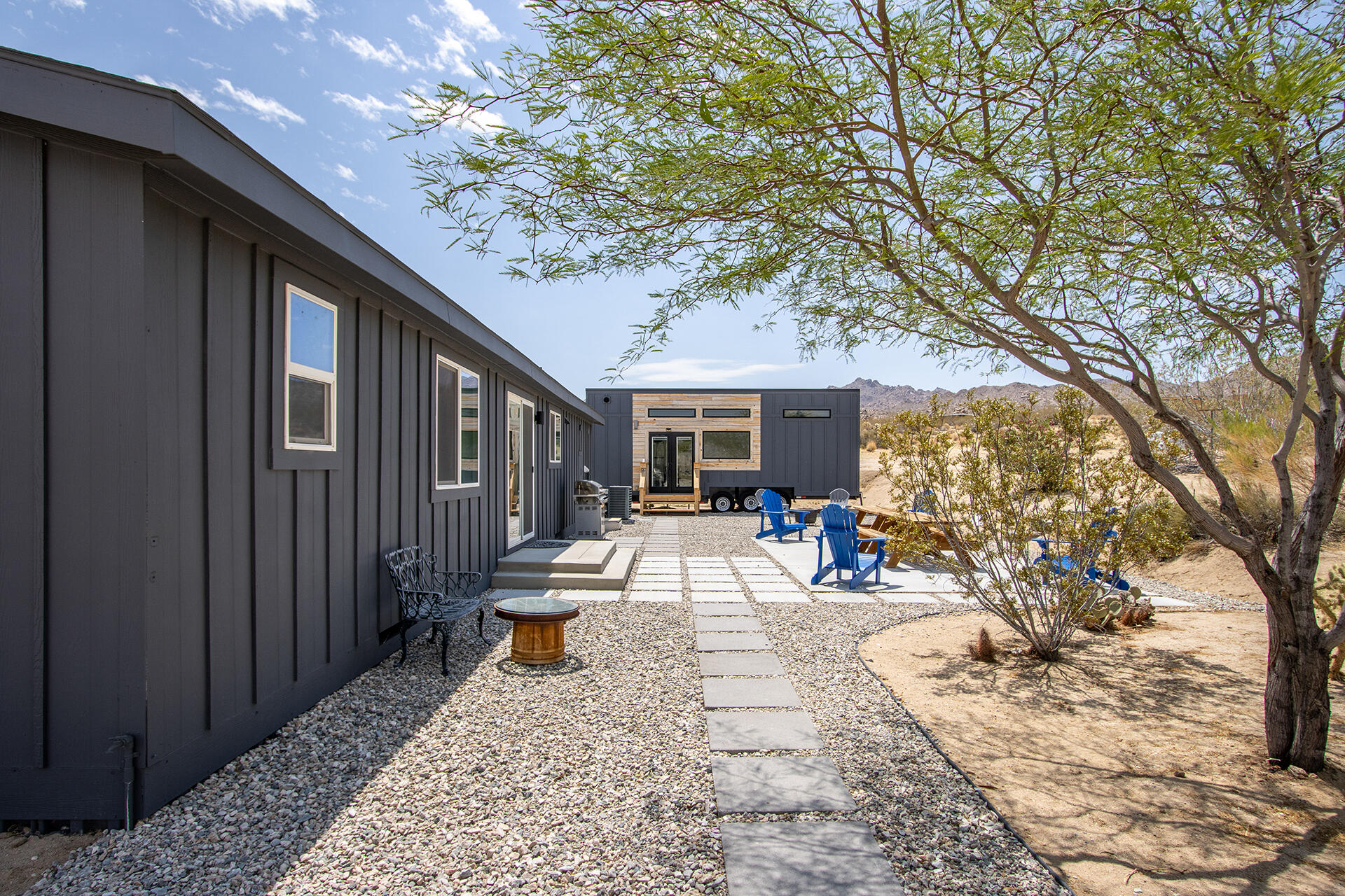 7122 Sunkist Road Joshua Tree, CA 92252 - Photo 61 of 61 a view of a house with backyard porch and sitting area