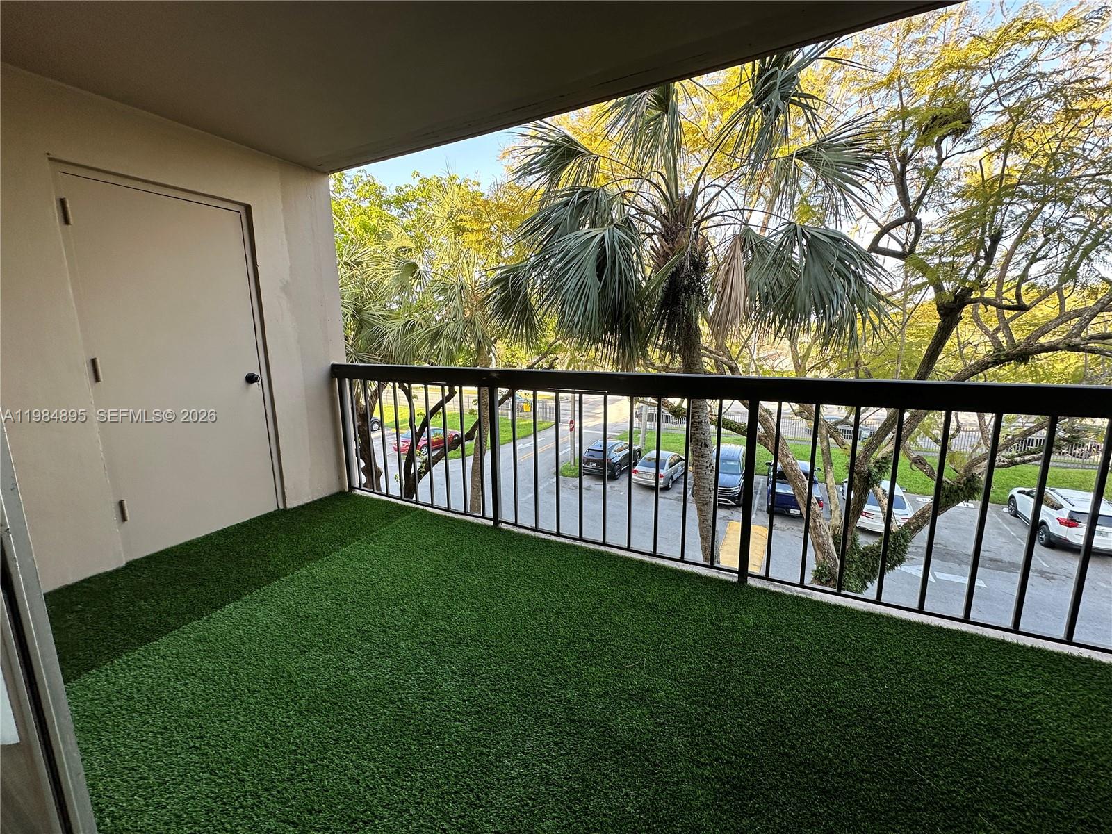 10425 Southwest 112th Avenue, Unit 324 Miami, FL 33176 - Photo 13 of 22 a view of a yard with a large trees