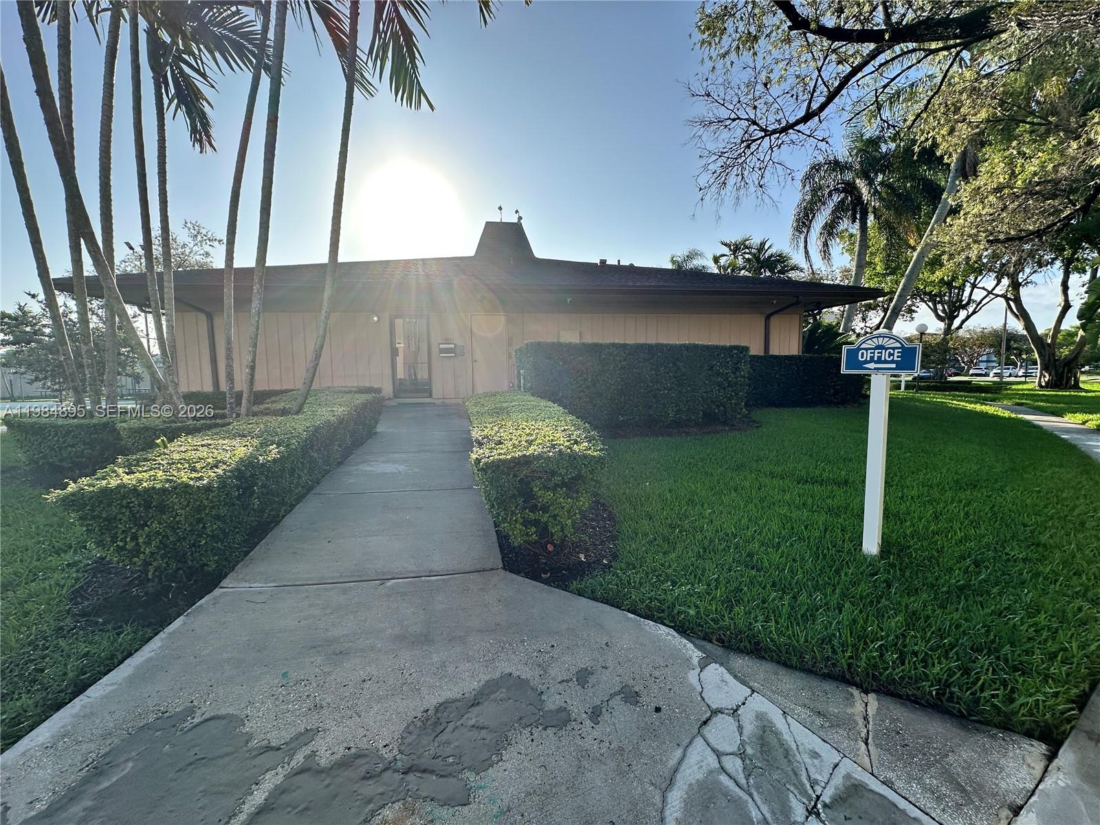 10425 Southwest 112th Avenue, Unit 324 Miami, FL 33176 - Photo 21 of 22 a backyard of a house with lots of green space