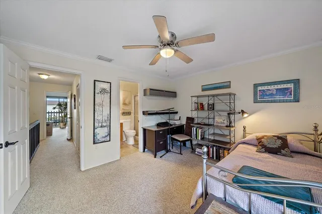 a bedroom with furniture and a window