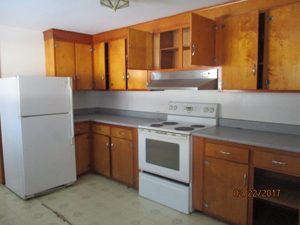 98 Jackson Road Hardwick, MA 01037 - Photo 4 of 18 a kitchen with stainless steel appliances granite countertop a refrigerator a stove and a sink