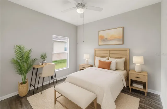 a view of kitchen with stainless steel appliances cabinets and wooden floor