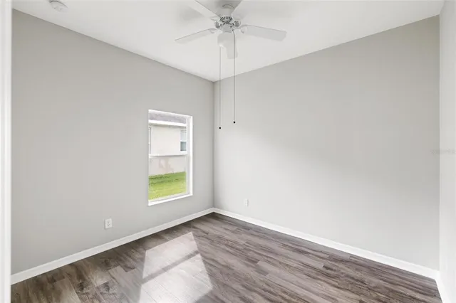 a view of a swimming pool with a garden