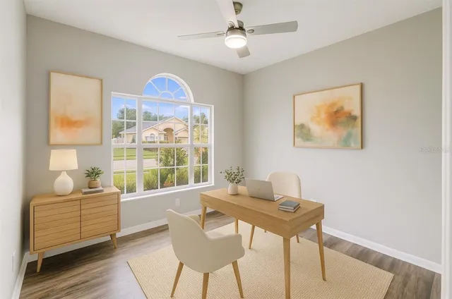 a bedroom with a bed and a table