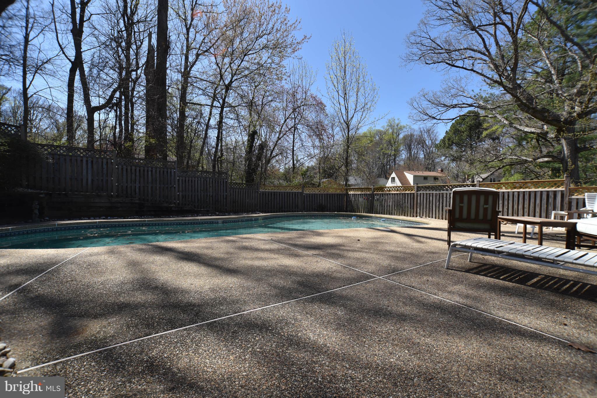 8645 Victoria Road Springfield, VA 22151 - Photo 17 of 19 a view of backyard with trees