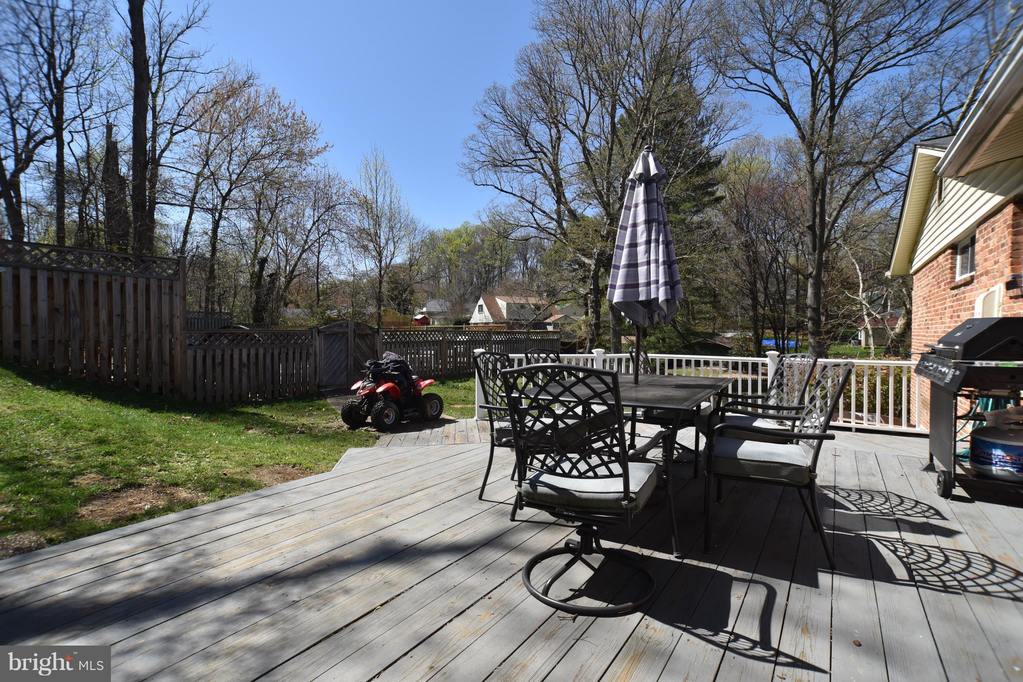 8645 Victoria Road Springfield, VA 22151 - Photo 18 of 19 a view of a patio with iron fence