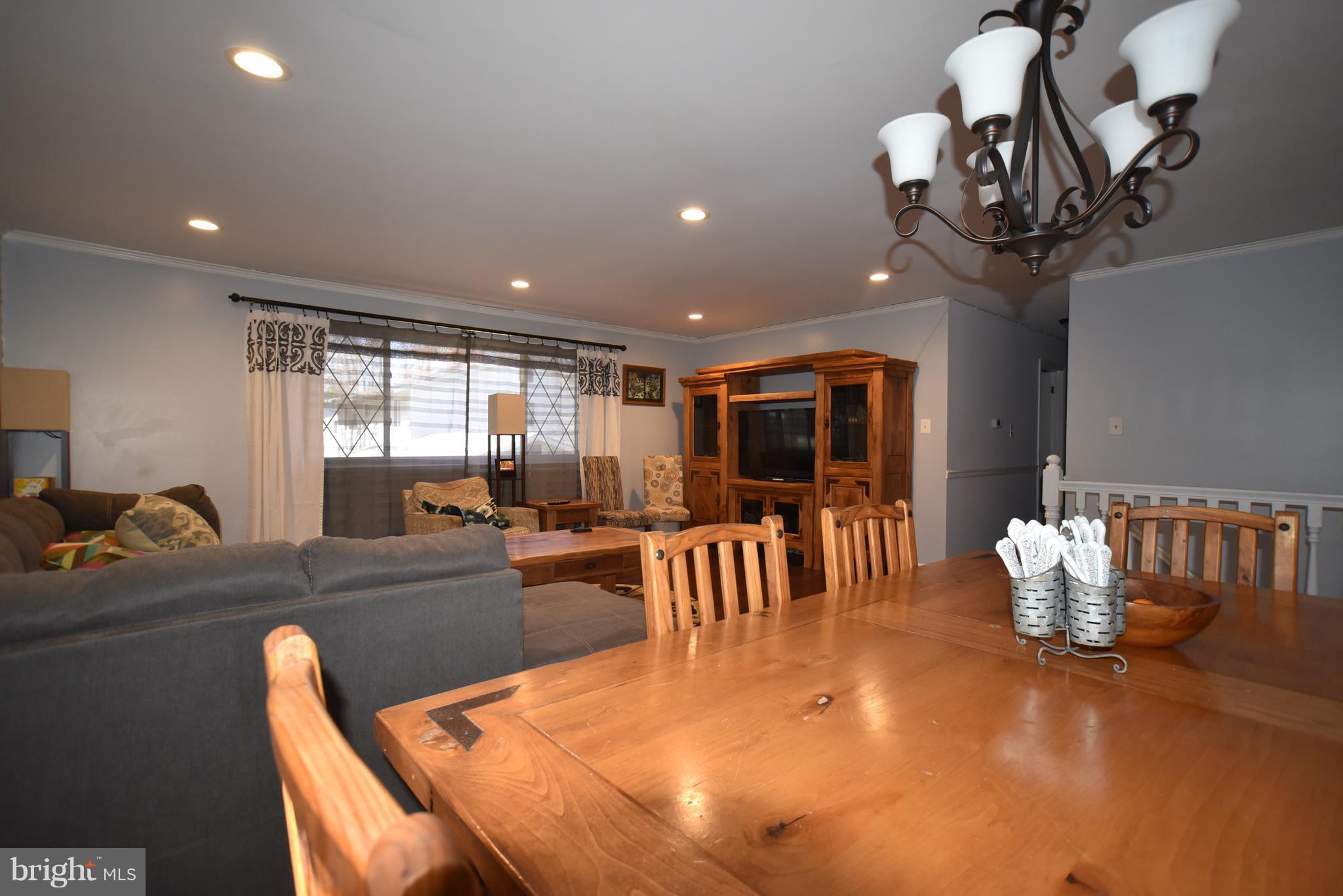 8645 Victoria Road Springfield, VA 22151 - Photo 7 of 19 a dining room with furniture and window