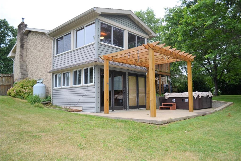 1129 Cheese Run Road Indiana, PA 15701 - Photo 20 of 25 a view of a house with a backyard and sitting area