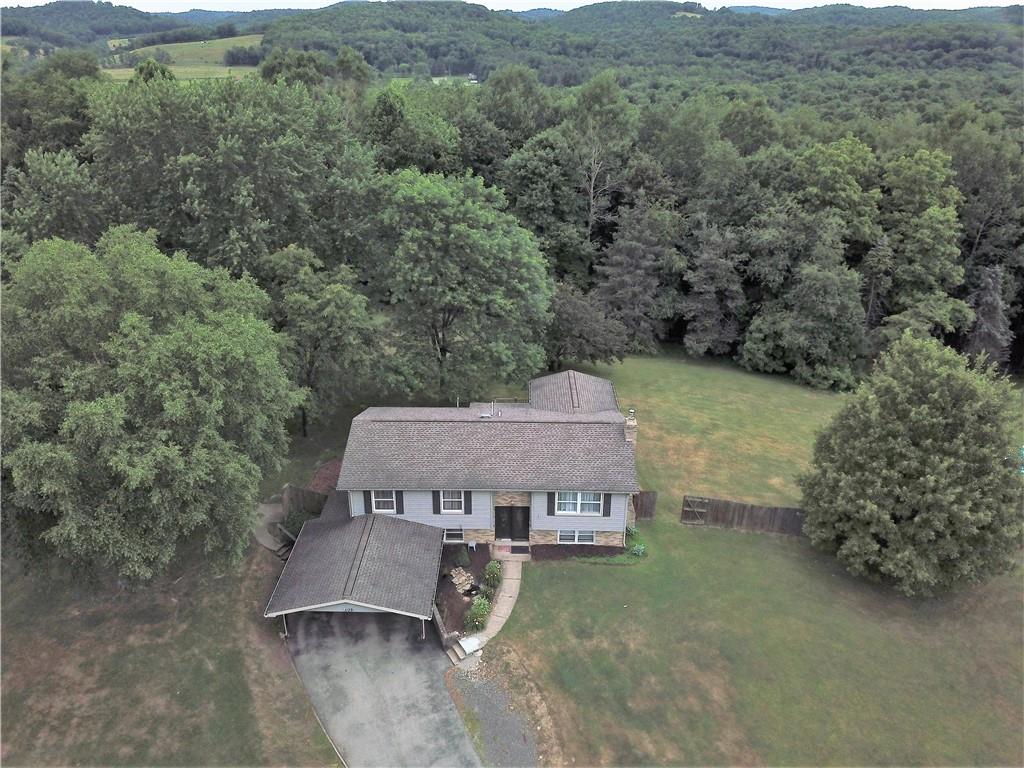 1129 Cheese Run Road Indiana, PA 15701 - Photo 24 of 25 an aerial view of a house with yard and outdoor seating