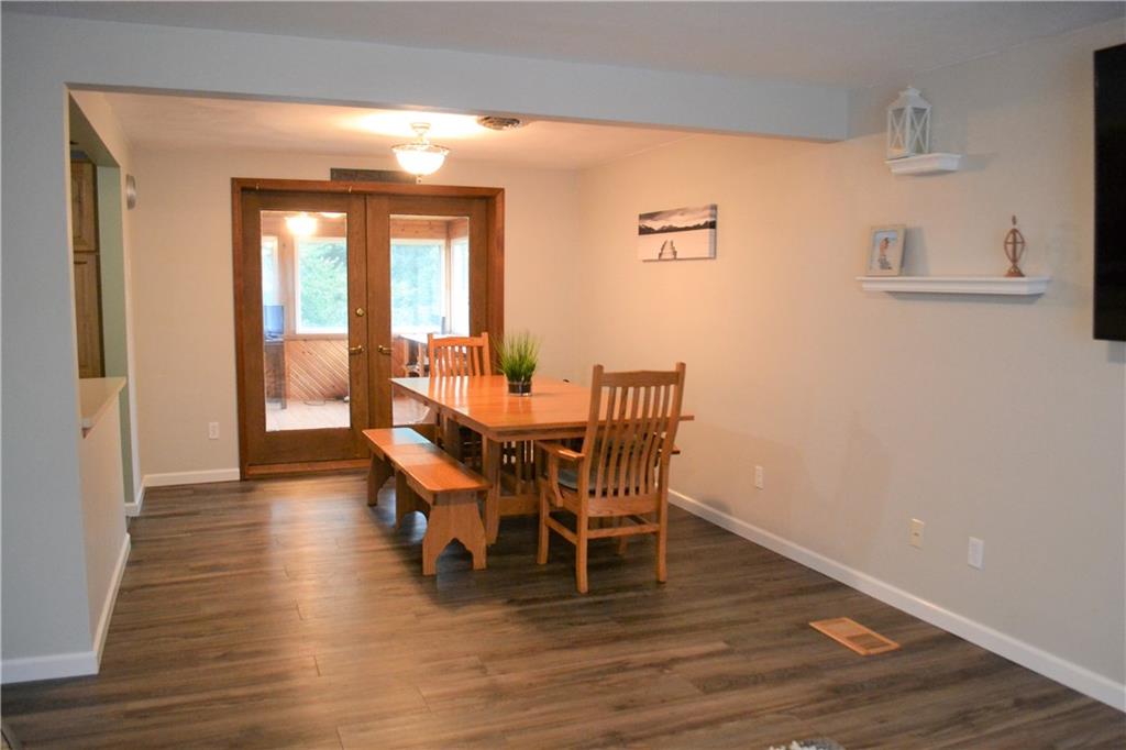 1129 Cheese Run Road Indiana, PA 15701 - Photo 5 of 25 a view of a dining room with furniture and wooden floor