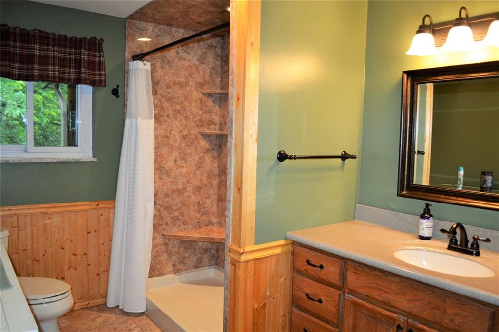 1129 Cheese Run Road Indiana, PA 15701 - Photo 8 of 25 a bathroom with a granite countertop sink toilet and shower